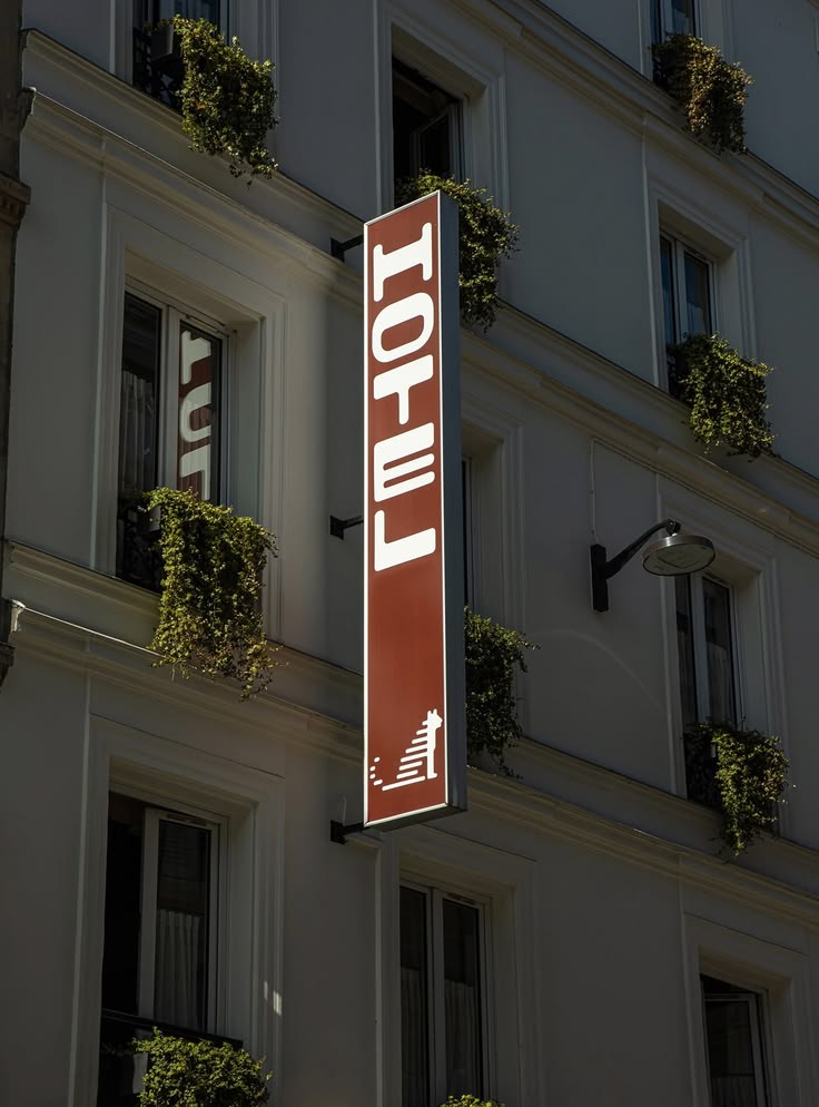 Marea Hotel vertical signage on building facade